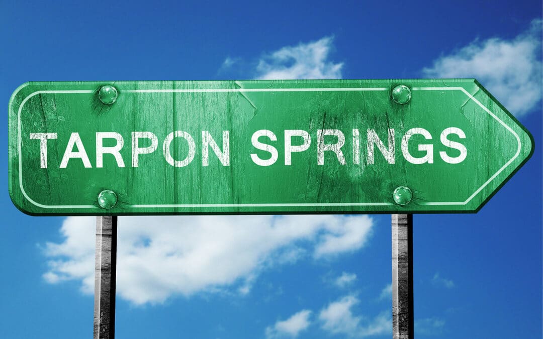 tarpon springs road sign on a blue sky background